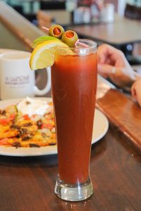 Bloody Mary with lemon, lime slices and olives at Los Altos Breakfast and Lunch.